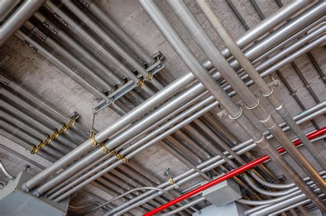 Premium Photo | Electrical metal conduit system many metal pipe ...