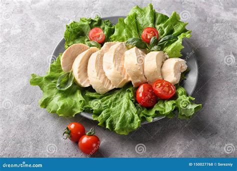 Boiled Chicken Fillet with Lettuce and Tomatoes on Plate Stock Photo ...