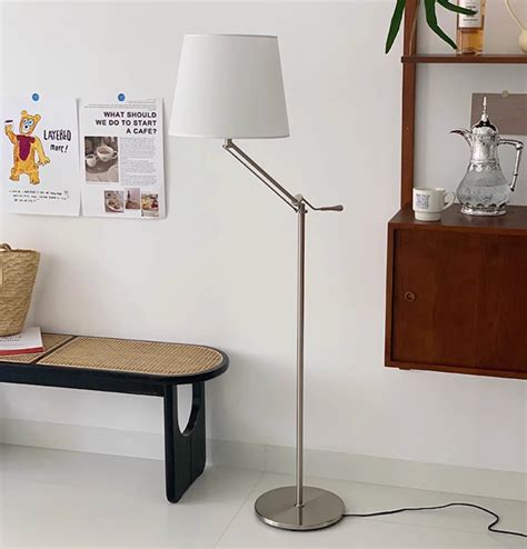 White minimal floor lamp - Studio by Drew