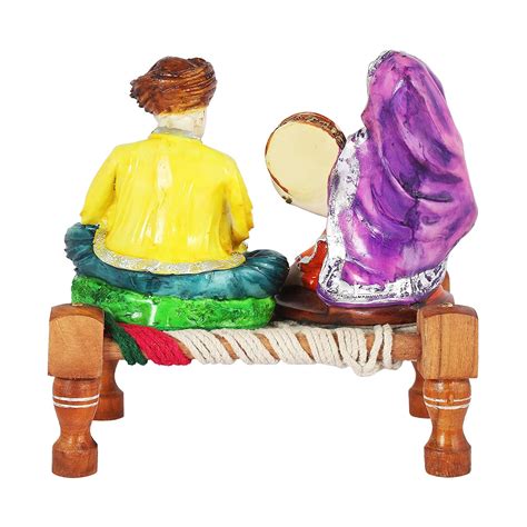 Buy Rajasthani Couple Showpiece: Exquisite Vastu & Musical Charm – Shop ...