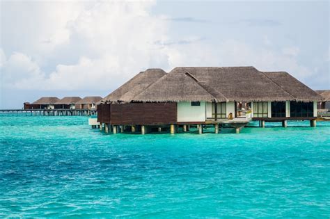 Beautiful overwater bungalows on the ocean in the maldives island ...