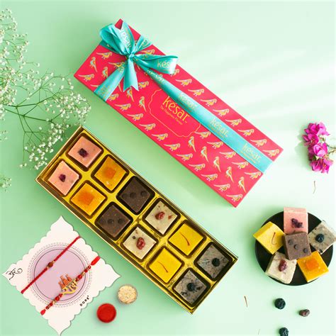 Assorted Cashew Fudge Gift Box With 2 Rakhis – Kesar Sweets