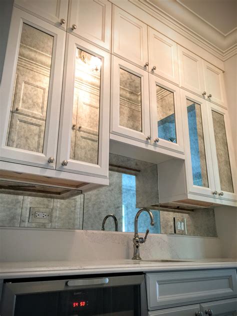 Antique Mirror Backsplash with Matching Cabinet Doors