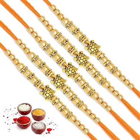Buy PopStore Golden Tortoise Pendant Moti Beads Designer Thread Rakhi ...