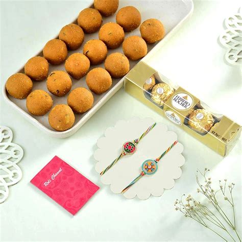 Send Set of Two Rakhi With Besan Laddoo & Ferrero Online | Rakhibazaar.com