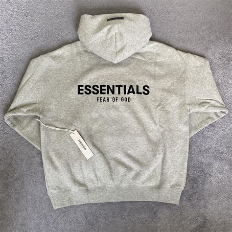 Essentials Men's Grey Hoodie | Depop