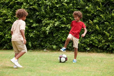 Kids Playing Soccer 的图像结果