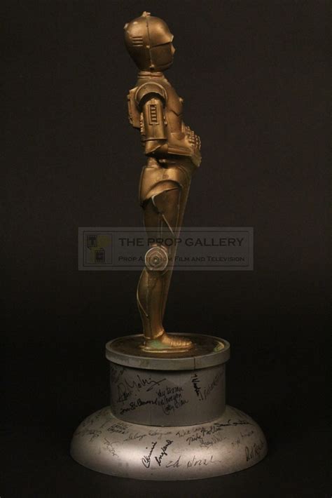 The Prop Gallery | ILM C-3PO Oscar statuette presented to Brian Johnson