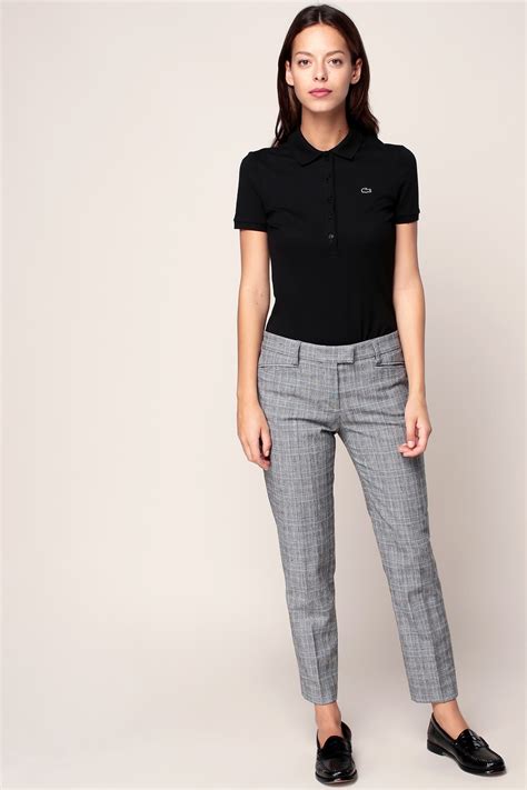 Lacoste Polo manches courtes noir patch logo brodé - Polo Femme ...