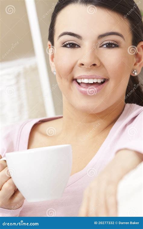 Beautiful Hispanic Woman Drinking Tea or Coffee Stock Photo - Image of ...