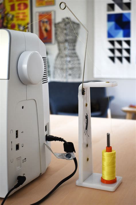 Image result for How to Use Large Thread Spool On Machine