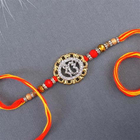 Send AD Ek Onkar Rakhi N Rudraksha Rakhi Set to Bhutan Online