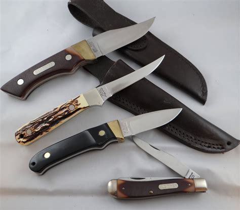 4 knives: OldTimer jack knife, 2 Schrade, 1 Uncle Henry