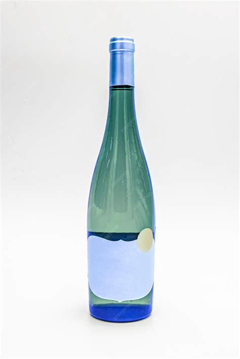 Premium Photo | A blue bottle of wine with a blue label that says'blue ...