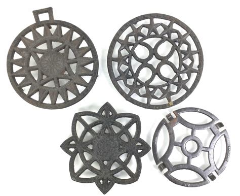 Lot - (4) Cast Iron Stove Iron Trivets