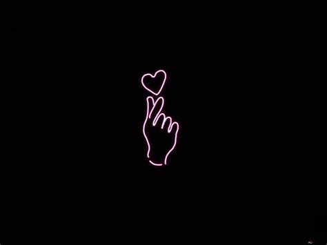 Hand made heart sign on black background HD wallpaper download