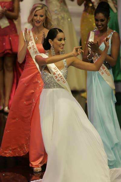 Chinas Zhang ZiLin, celebrates after winning the Miss World beauty ...