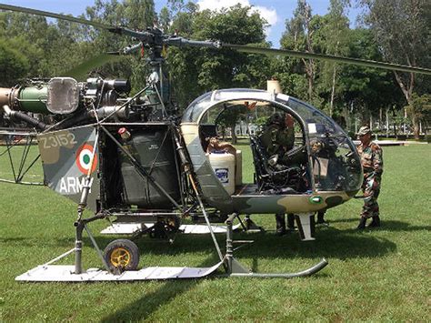 Rescue team boarding a Indian air force helicopter - J&K floods: Rescue ...