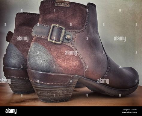 Brown leather ankle boots Stock Photo - Alamy