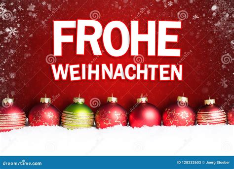 Christmas Ball in the Snow with Message `Merry Christmas` in German ...