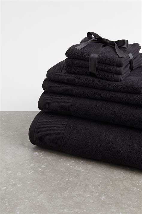 Cotton terry hand towel - Black - Home All | H&M IN