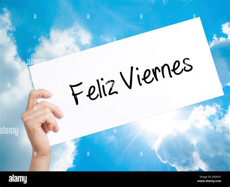 Feliz Viernes (Happy Friday In Spanish) Sign on white paper. Man Hand ...
