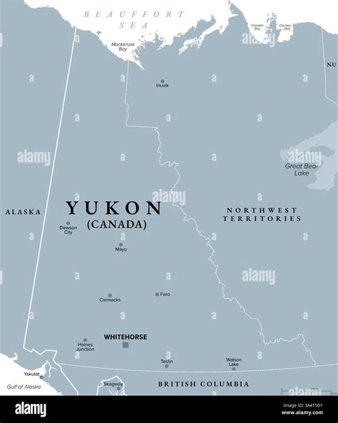 Yukon, westernmost territory of Canada, gray political map, with capital Whitehorse and seven ...