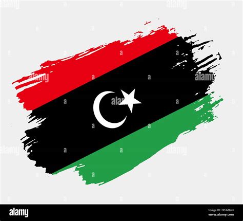 Artistic grunge brush flag of Libya isolated on white background. Elegant texture of national ...