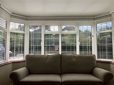 Wood venetian blinds in pure white for bay window | Living room blinds ...