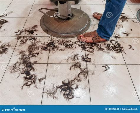 Dirty Floor of a Hair Salon with Hairs on Floor in Barber Shop Stock ...