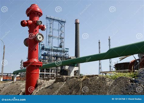 Oil refinery fire hydrant stock photo. Image of piping - 10134768