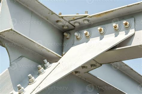 Bolts and nuts on metal plates of steel structure of heavy duty ...