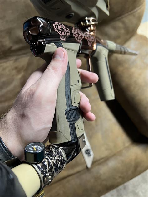 Finally got my gun back from anno! Now my infamous cs2 matches my headband! : r/paintball