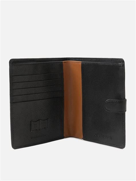 Atlas Black Leather Passport Holder by IRTH | House of Titan