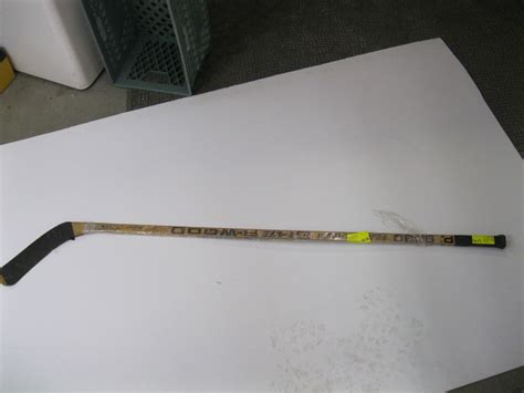 MULTI SIGNED SHERWOOD HOCKEY STICK