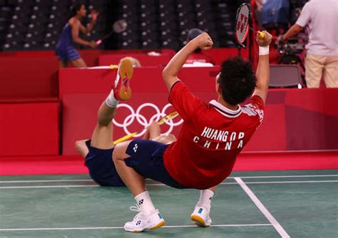 Huang Dongping of China and Wang Yilyu of China celebrate winning their ...