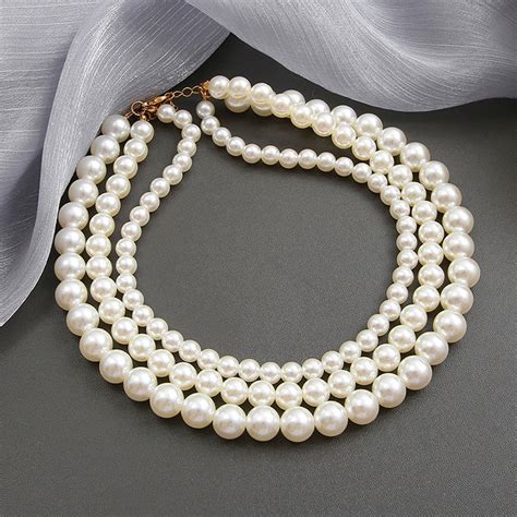 Buy White Gold Plated Pearl Studded Multi-Strand Layered Necklace For ...