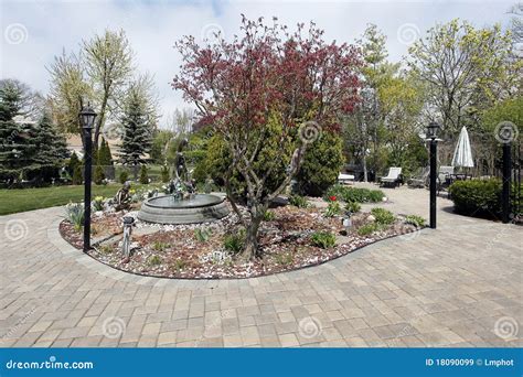 Brick Patio with Water Fountain Stock Image - Image of decorate, decor ...