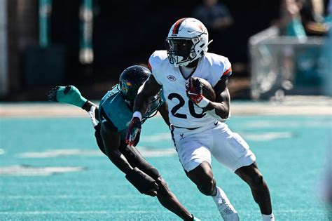 Xavier Brown sparks potent ground game as UVA races past Coastal ...