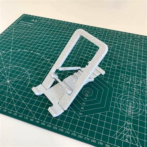 STL file Print-in-Place Foldable Phone Holder・3D print design to ...
