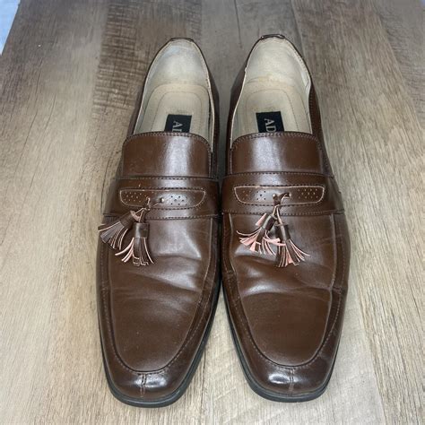 Brown leather loafers with tassel laces. - Depop