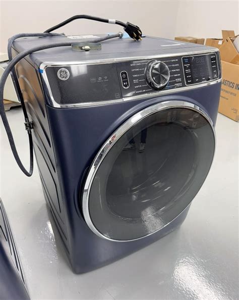 Lot Consisting Of: (1) GE Front load washing machine, model ...