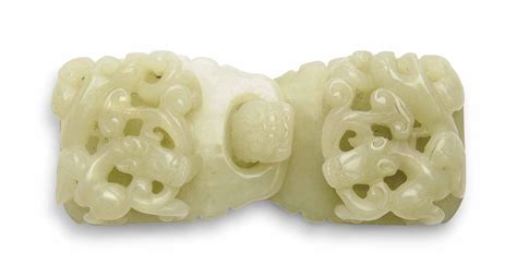 A CHINESE PALE CELADON JADE BELT BUCKLE , 19TH/20TH CENTURY | Christie