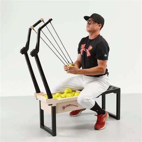Image result for Manual Pitching Machine