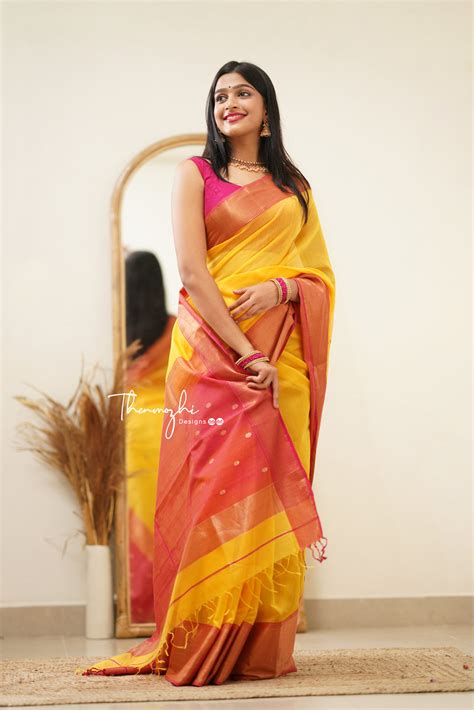 Shop Yellow Maheshwari Silk Cotton Saree with Pink Border Online