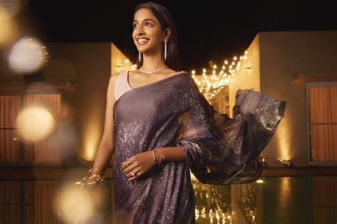 Creating stunning looks with printed satin sarees