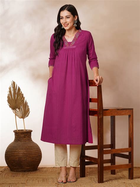 A-line woven cotton kurta with vibrant thread embroidery and gathering ...