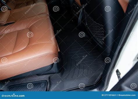 Clean Car Floor Mats of Black Rubber Under Rear Passenger Seat in the ...