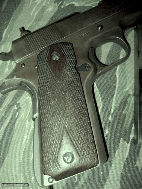 Colt 1911 Original with three magazines for sale