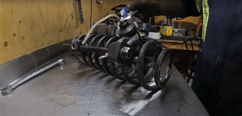 Image result for Using a Spring Compressor Tool